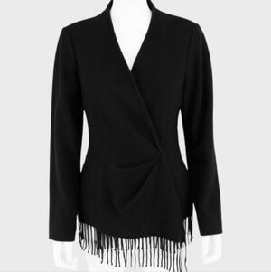 This is a vintage Thierry Mugler black wool and angora blend jacket with fringe